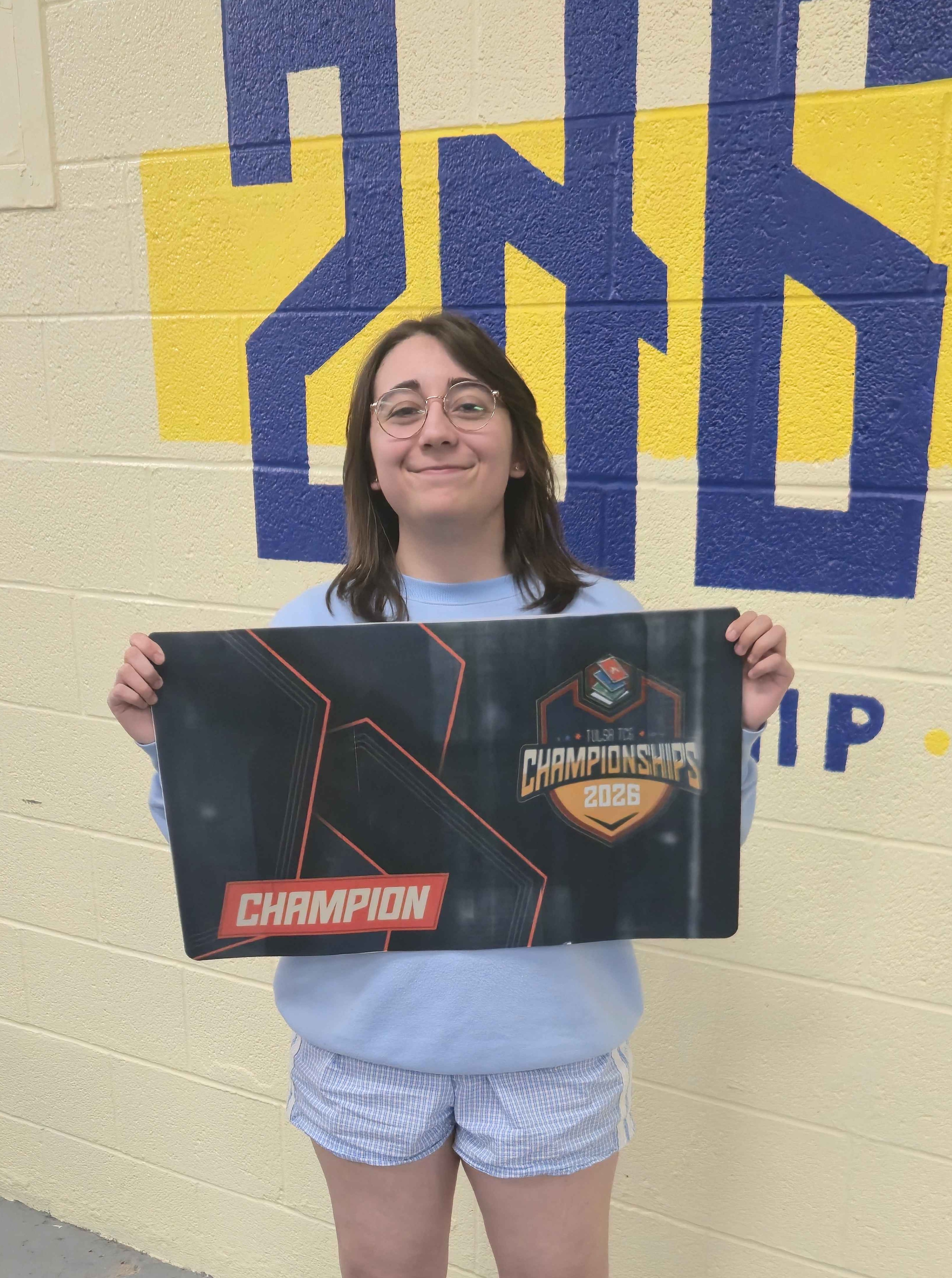 Portrait of Alyssa with Tulsa Champ Mat